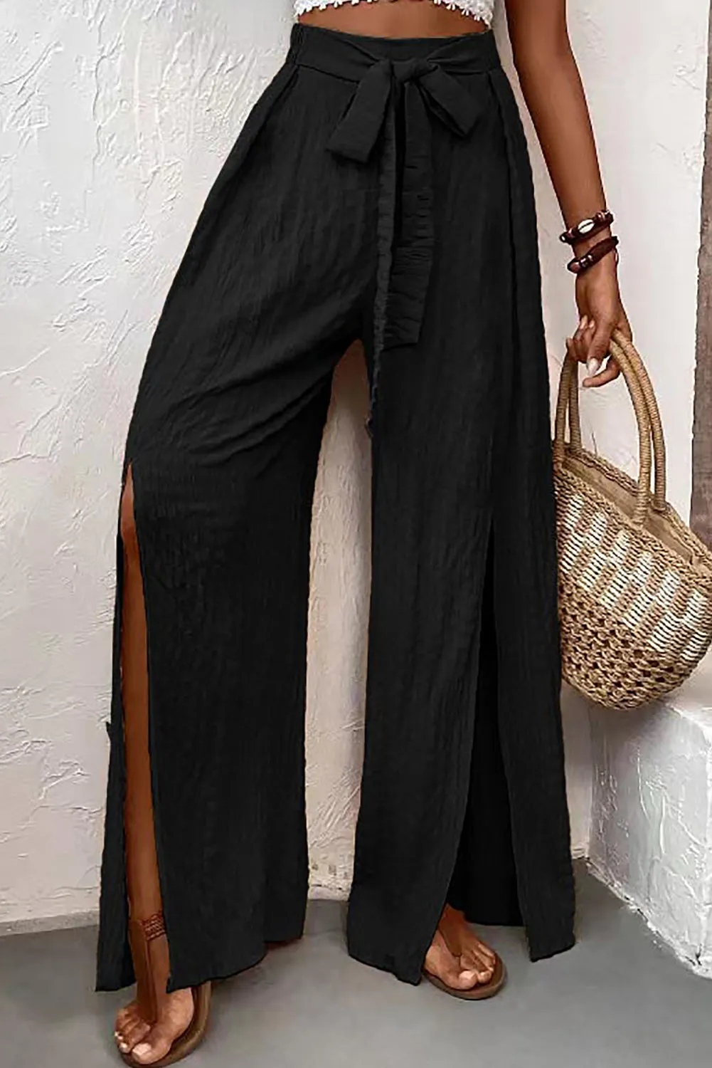 Blue Zone Planet |  Black Crinkle Texture Knot Waist Slits Flared Pants