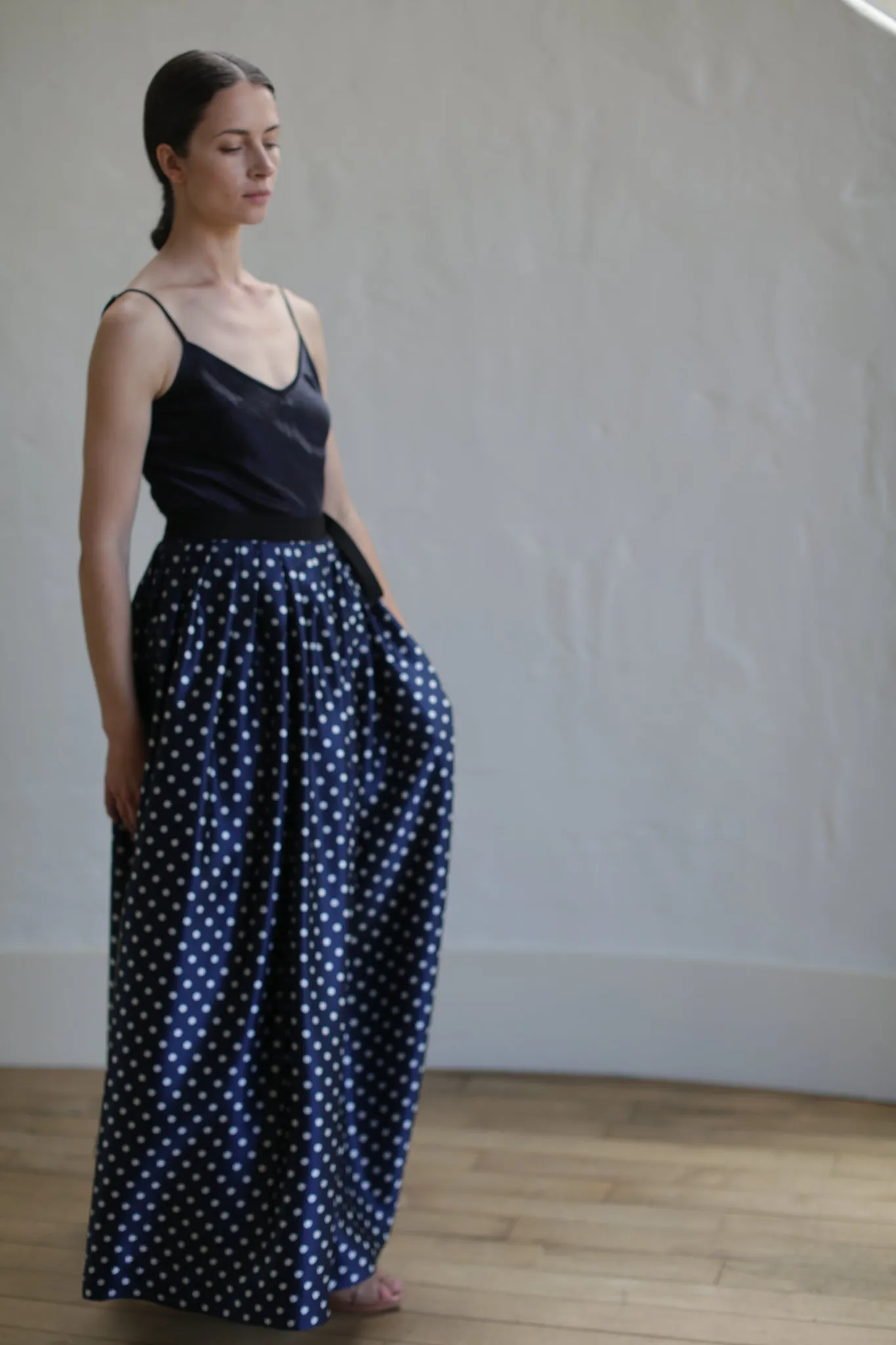 Charmeuse Pleated Long Wrap Skirt | Navy Polkadot