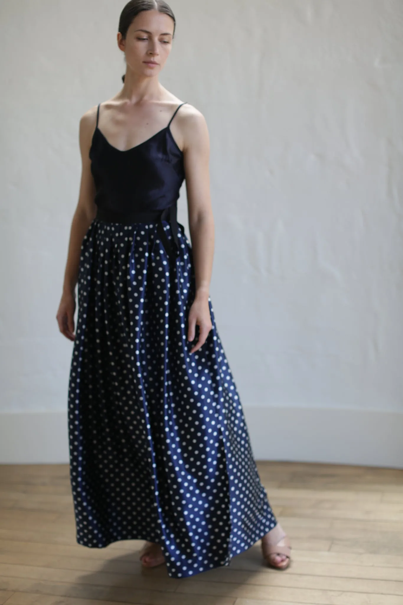 Charmeuse Pleated Long Wrap Skirt | Navy Polkadot