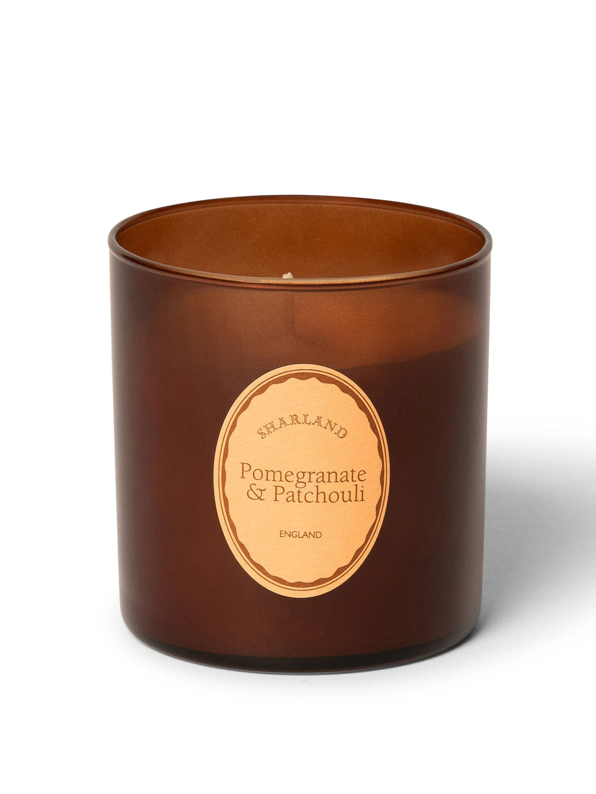 Pomegranate and patchouli scented candle