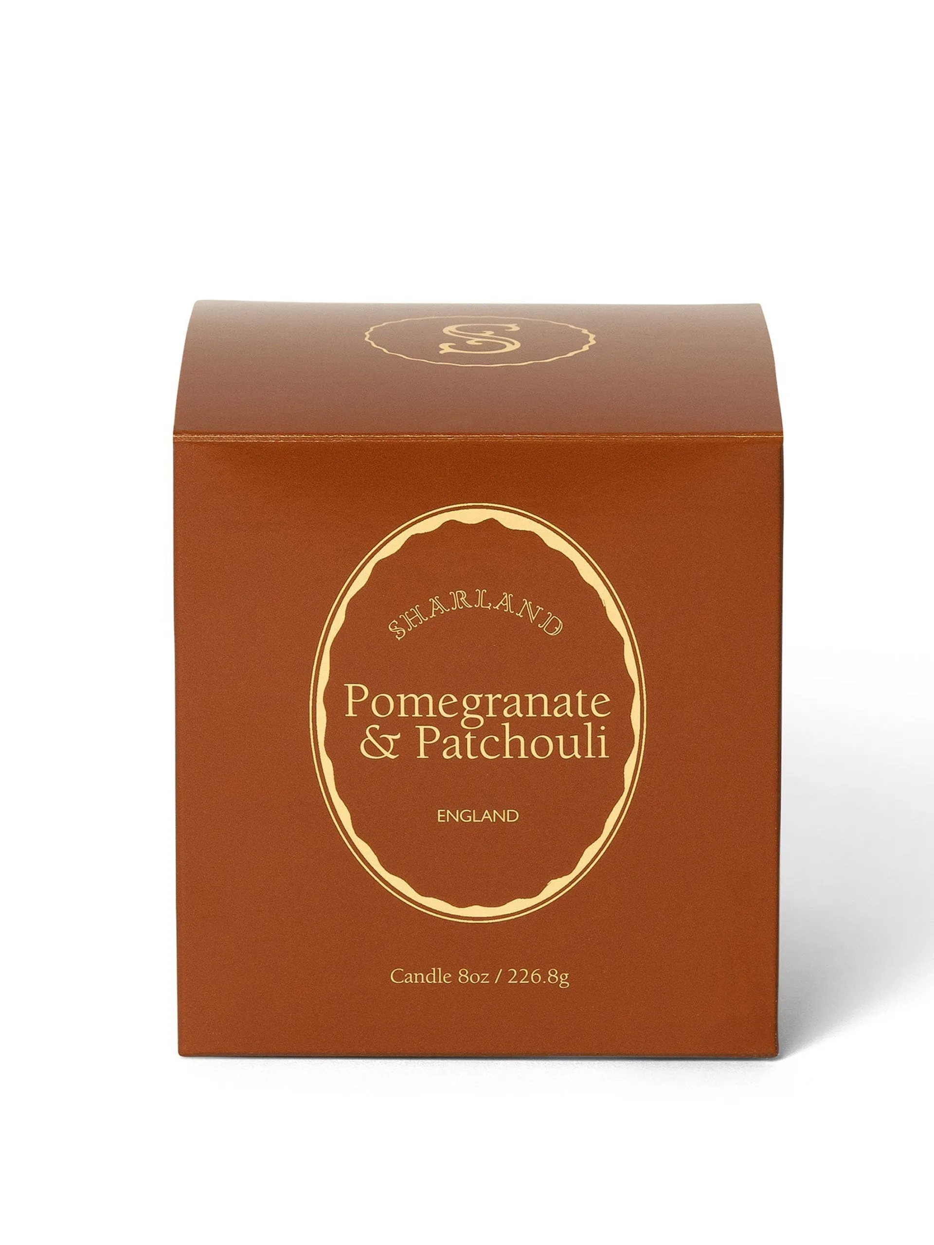 Pomegranate and patchouli scented candle